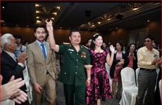 Bị can Lê Xuân Giang (mặc quân phục) tại một cuộc hội thảo của Liên kết Việt
