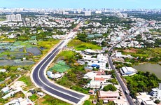 Dự án Xây dựng đường song hành Quốc lộ 50 còn vướng nhiều hộ dân chưa bàn giao mặt bằng. Ảnh: Minh Hoàng