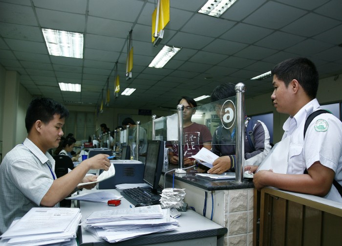 Nhiều cơ quan yêu cầu DN phải có xác nhận ngành nghề đang kinh doanh trong khi luật đã bỏ. Ảnh: Tất Tiên