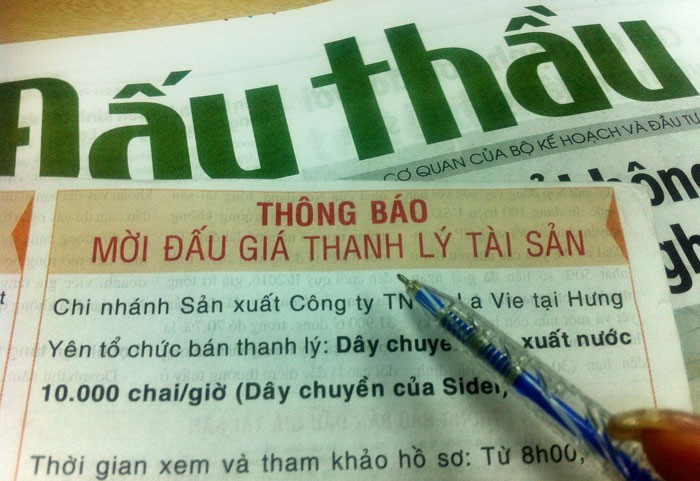 Luật Đấu giá tài sản quy định phải công khai thông báo bán đấu giá trên báo in hoặc báo hình để minh bạch hoạt động bán đấu giá tài sản. Ảnh: Lê Tiên