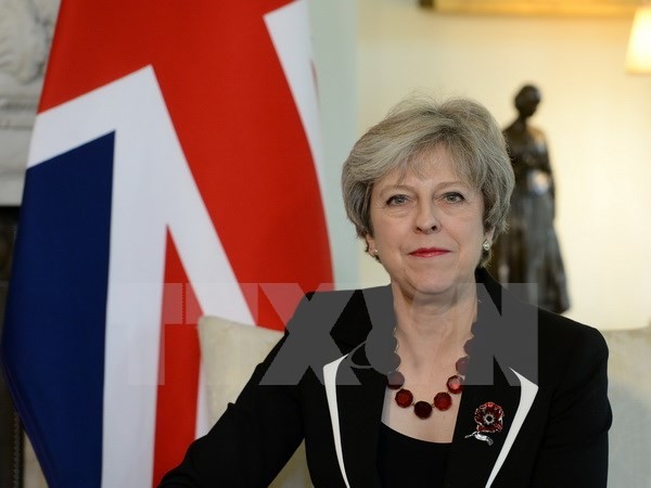 Thủ tướng Anh Theresa May phát biểu tại một hội nghị ở London. (Nguồn: AFP/TTXVN)