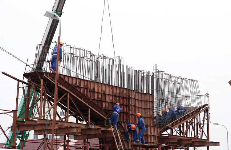 Cơ chế cho phép địa phương công bố giá riêng biệt là kẽ hở để các đơn vị tăng chi phí đầu tư xây dựng. Ảnh: Tường Lâm