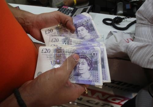 Giá đồng bảng Anh tiếp tục tăng. Ảnh: EPA