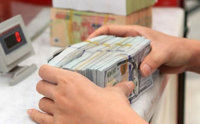 Giá USD hôm nay 16/2 tại Vietcombank tăng 10 đồng. Ảnh minh họa: TTXVN