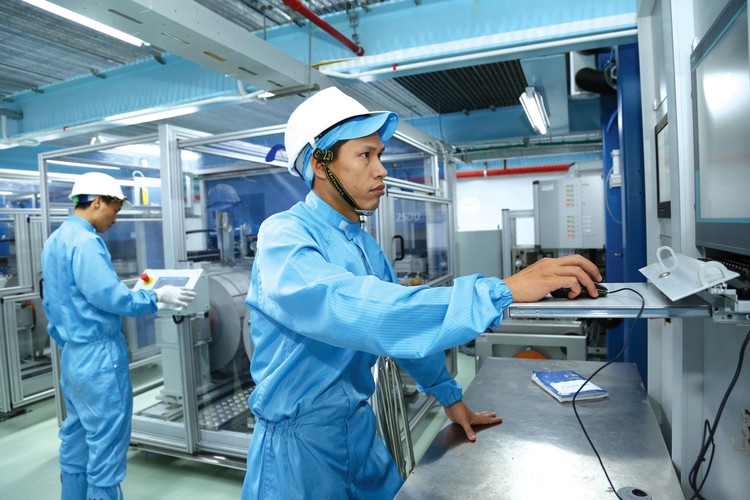 Thúc đẩy công nghiệp hóa, hiện đại hóa nhằm góp phần thực hiện mục tiêu đưa Việt Nam trở thành nước đang phát triển có công nghiệp hiện đại, thu nhập trung bình cao vào năm 2030. Ảnh: Nhã Chi