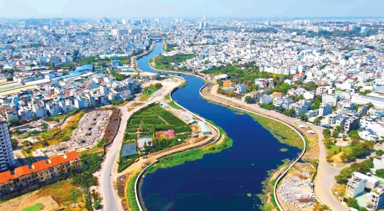 Dự án Xây dựng hạ tầng và cải tạo môi trường kênh Tham Lương - Bến Cát - rạch Nước Lên đã và đang mang lại đời sống mới cho hàng triệu người dân TP.HCM. Ảnh: Anh Tú