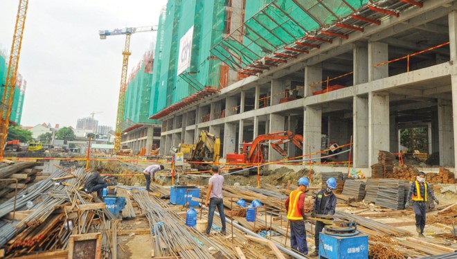 Thiếu quy chuẩn thiết kế, thi công khiến doanh nghiệp địa ốc gặp nhiều khó khăn trong việc xin cấp phép xây dựng.