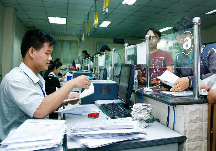 Hàng nghìn điều kiện kinh doanh vẫn còn tồn tại đang tạo nhiều rào cản hành chính, làm giảm sức cạnh tranh của môi trường đầu tư, kinh doanh. Ảnh: Nhã Chi