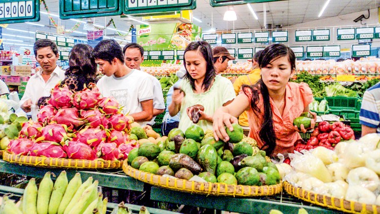 Tăng trưởng kinh tế có nhiều yếu tố tích cực, nhưng cần cảnh giác hơn với áp lực lạm phát. Ảnh: NC st