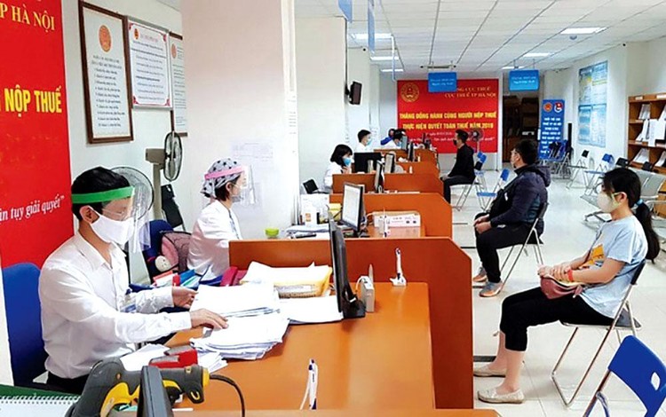 Lũy kế đến ngày 6/8/2021, cơ quan thuế đã nhận được 137.118 đơn đề nghị gia hạn nộp thuế, tiền thuê đất. Ảnh: Vi Vi