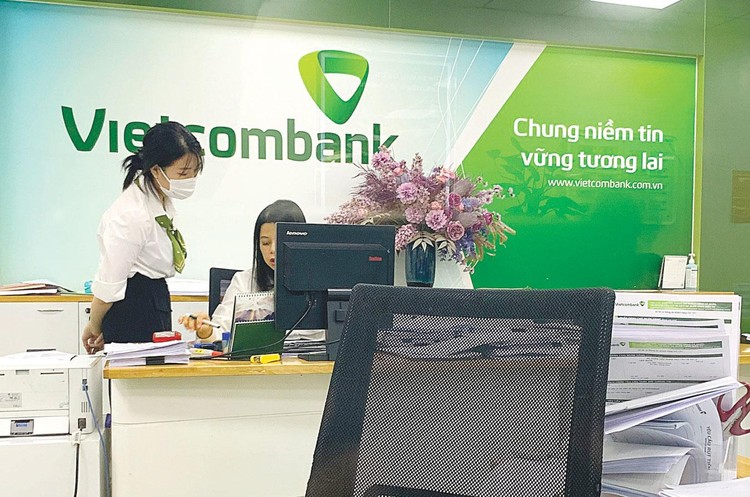 Vietcombank dẫn đầu hệ thống ngân hàng với tỷ lệ trích lập dự phòng bao phủ nợ xấu đạt 506%, tăng mạnh so với con số 424,3% thời điểm đầu năm 2022. Ảnh: Song Lê