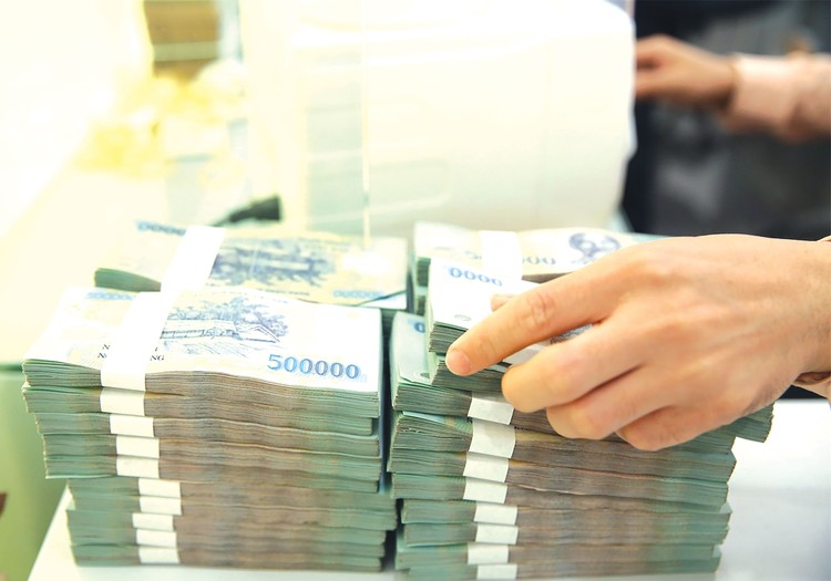 Bộ Tài chính được bổ sung 11.407,336 tỷ đồng để chi trả chế độ cho 10.444 người khi sắp xếp tổ chức bộ máy. Ảnh: Nhã Chi