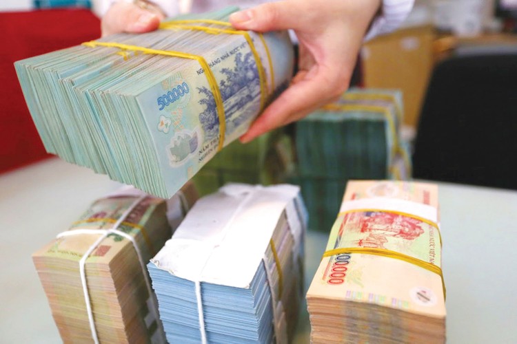 Dự thảo Luật Ngân sách nhà nước (sửa đổi) nâng mức trần nợ vay cho các địa phương lên 80 - 120% số dự toán thu ngân sách địa phương được hưởng theo phân cấp. Ảnh: Minh Dũng