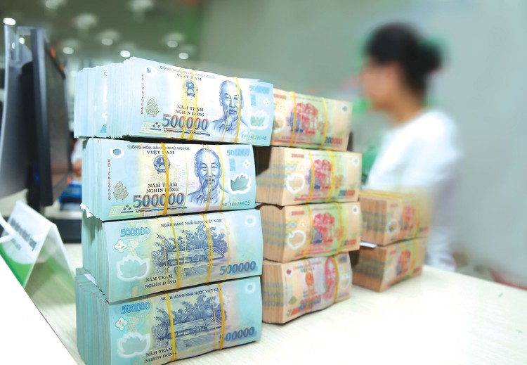 Việc cho vay đặc biệt được Ngân hàng Nhà nước thực hiện từ nguồn tiền thực hiện chức năng của ngân hàng trung ương về phát hành tiền, không sử dụng nguồn tiền từ ngân sách nhà nước. Ảnh: Lê Tiên
