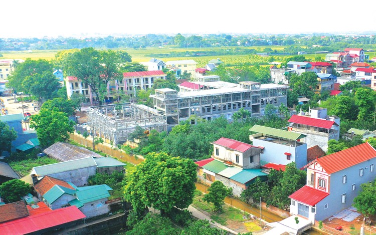Nhiệm vụ quản lý nhà nước về xây dựng của UBND huyện, quận, thị xã, thành phố thuộc tỉnh do UBND cấp xã thực hiện. Ảnh: Tiên Giang